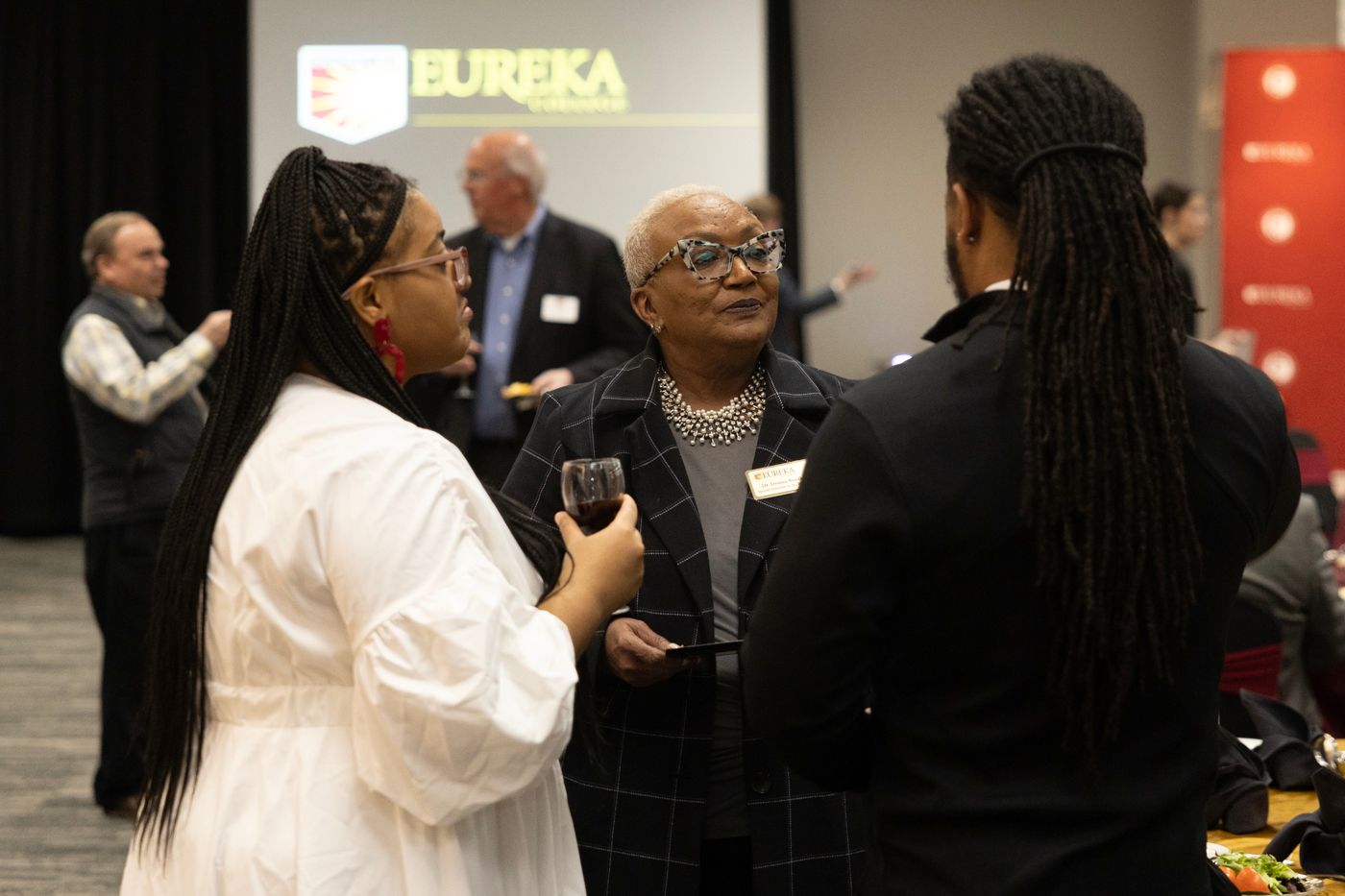Alumni talking before event